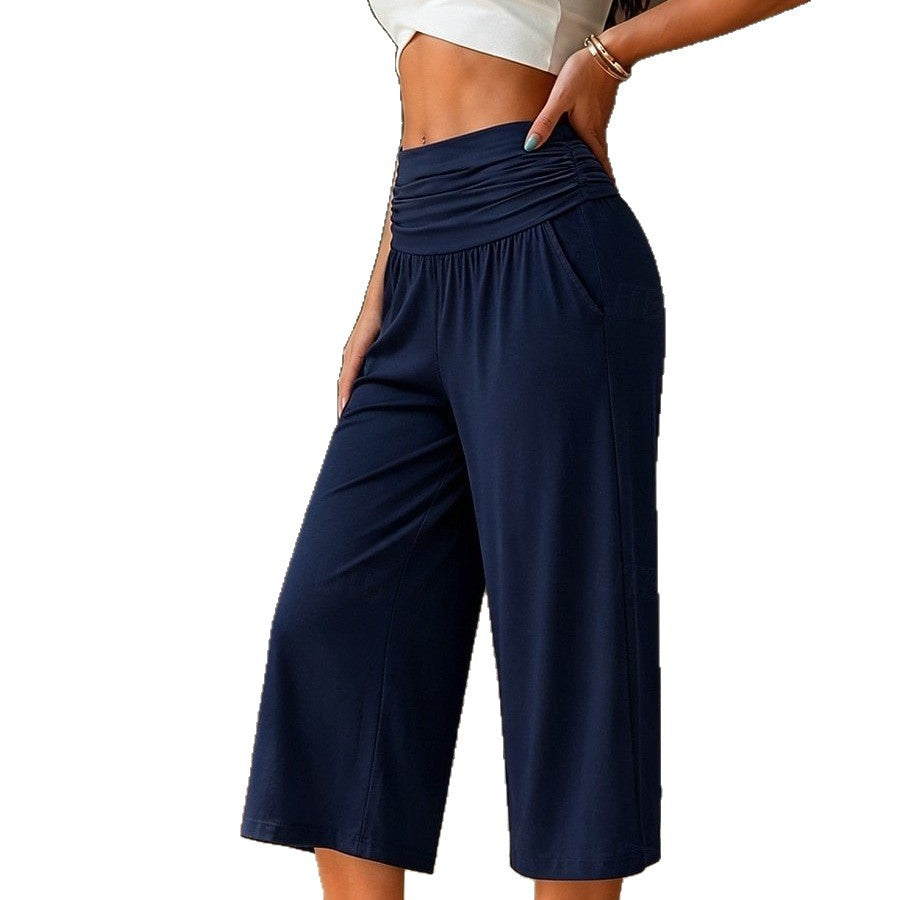 Avslappnade yogabyxor i caprimodell